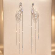 Crystal-Pearl Cascade Tassel Earrings on beige display