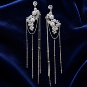 Crystal-Pearl Cascade Tassel Earrings on navy velvet