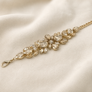 Champagne-colour floral stone arrangement and clasp detail