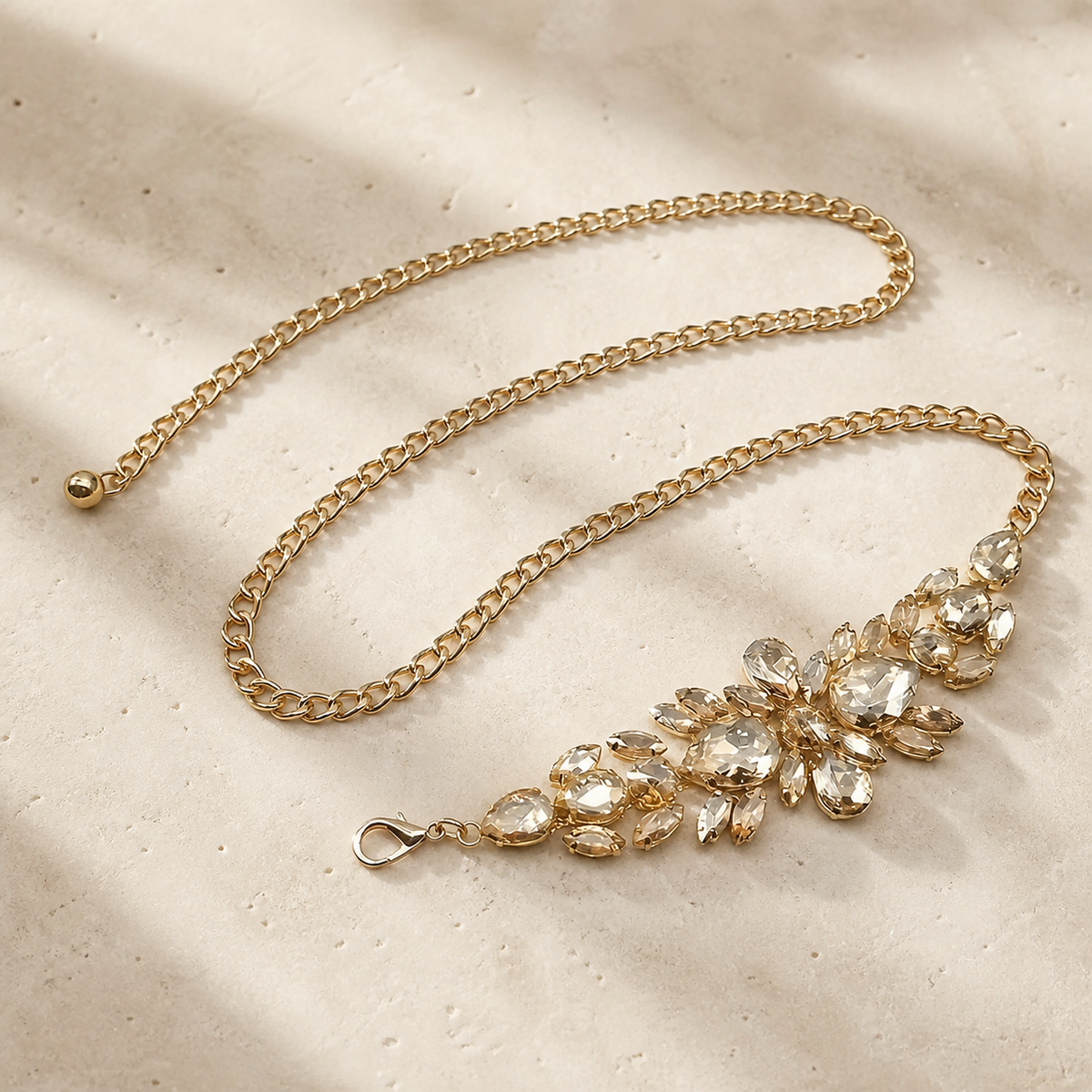 Gold-tone champagne crystal floral chain belt, full length