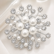 Silver-tone pearl and crystal snowflake brooch