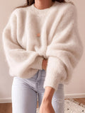 High-quality Sweater with a Soft Texture, Offering Comfortable and Loose-fitting Wear. The Eleg